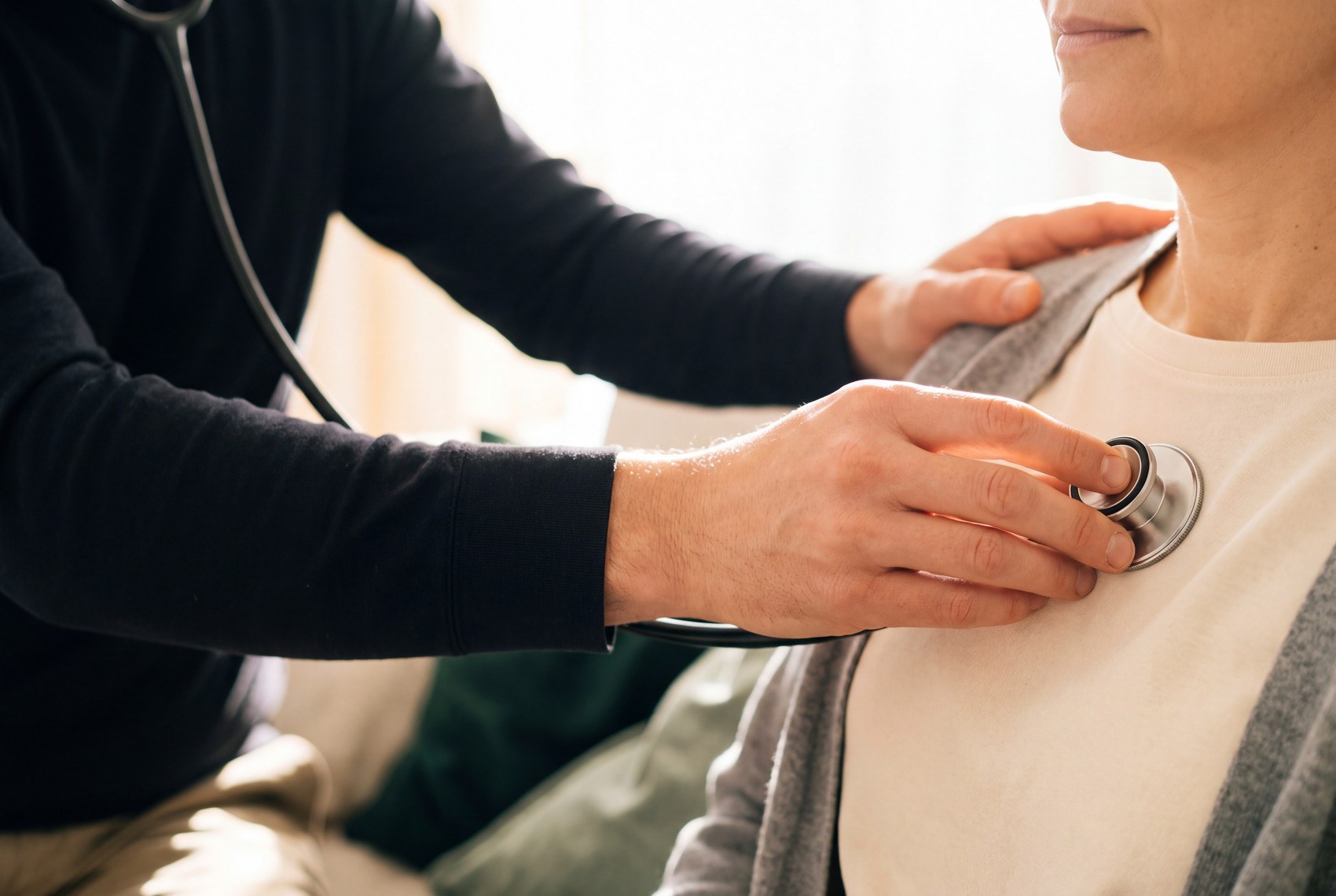 Physician examining a patient
