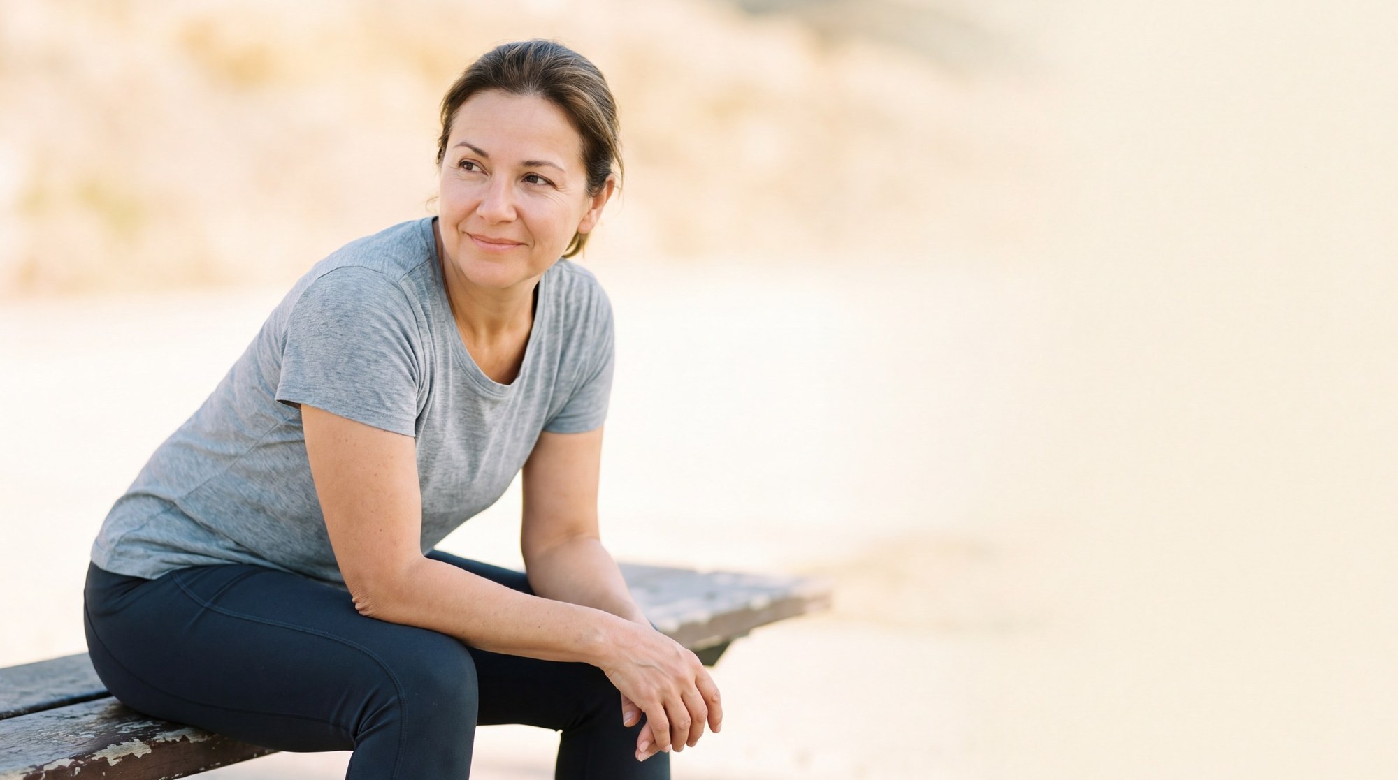 Active woman in midlife outdoors after exercise